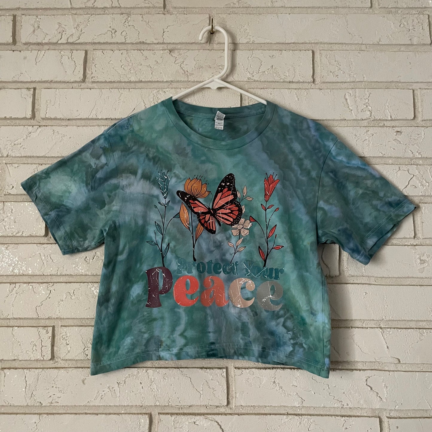 “PROTECT YOUR PEACE” Cropped Tie-dye Graphic Tee - Size Small